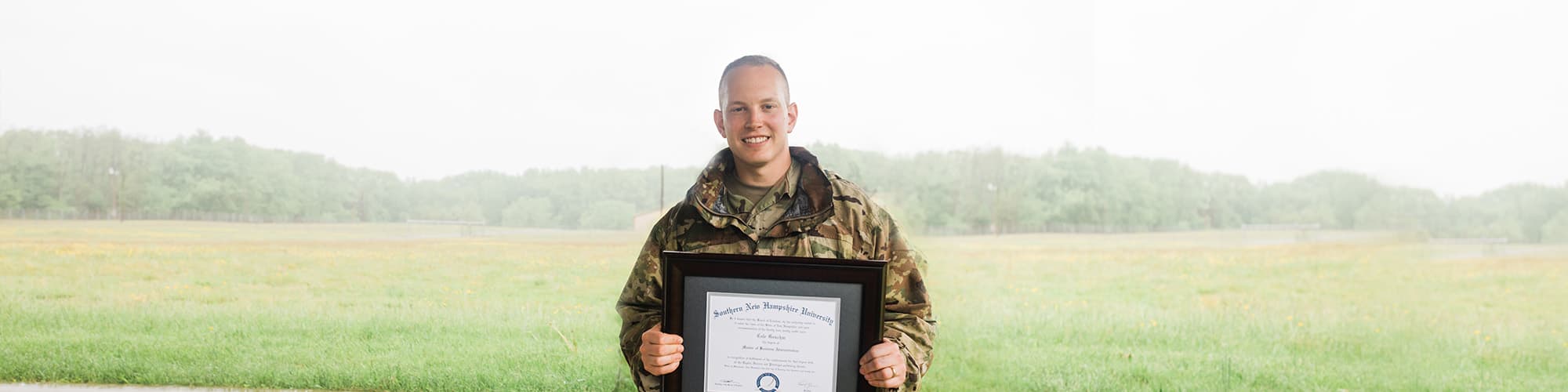An SNHU Military graduate with their diploma